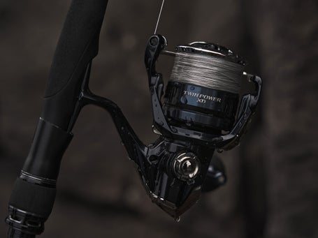 shimano ax fb spinning reel 2500FB Ted's Sports Center Elevate your fishing performance with the Shimano 25 Twin Power XD 4000XG Spin Reel Shimano TPXD4000XGFB TwinPower XD FB