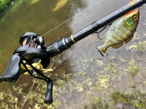 The Bates OG 100 mounted on a rod with a Jackall Giron swimbait rigged up.