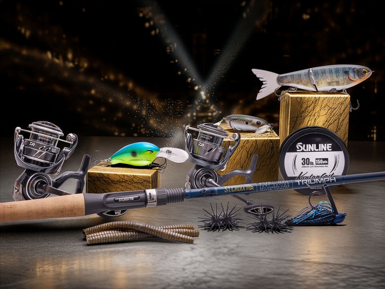 Image of mutlitple bass fishing baits sitting atop tiered blocks