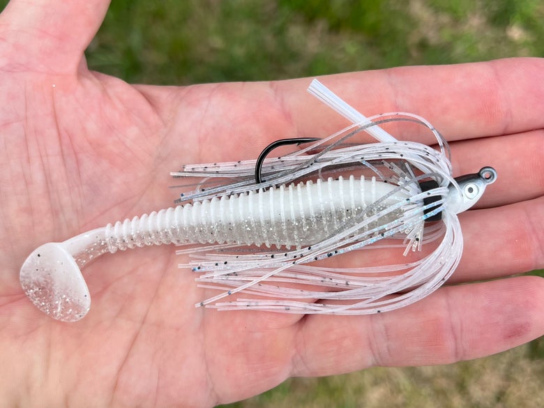 A Dirty Jigs Finesse Swim Jig is shown rigged with a shad-colored Keitech Swing Impact Fat swimbait.