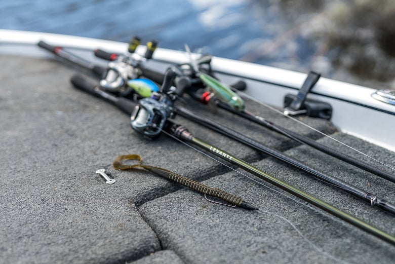 Curly tail worm rigged and laying on the deck of a boat