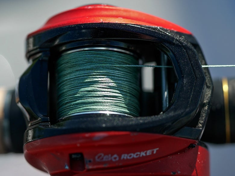 Close-up image of a casting reel spooled with braided line