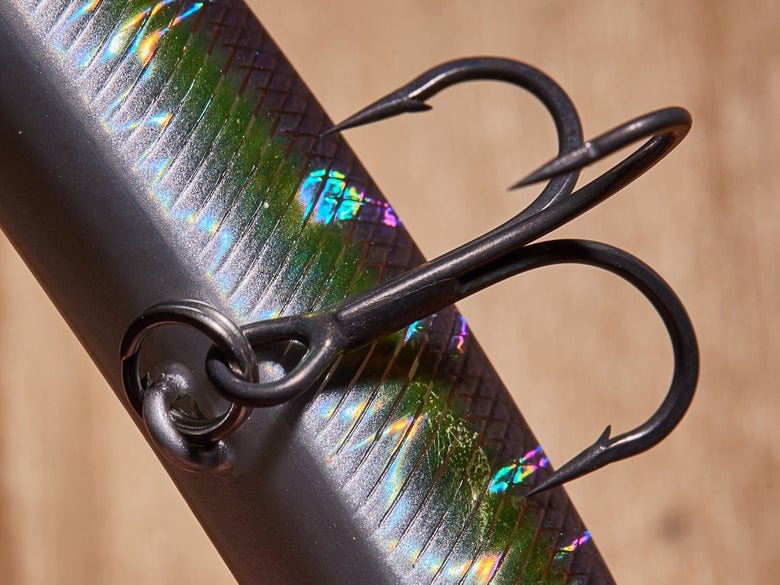 Detailed shot of the hook hanger, split ring, and treble hook utilized on a spybait.