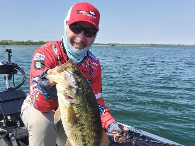 Mark Menendez Holding Wakebait Bass