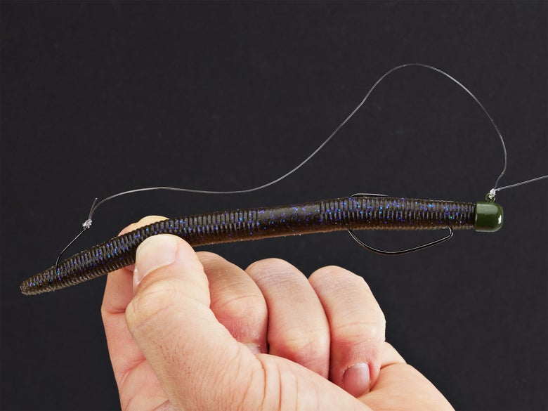 Soft stickbait rigged on a weedless shakey head with a stinger hook.