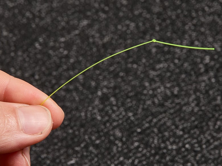 small overhand knot tied on the tag end of your line