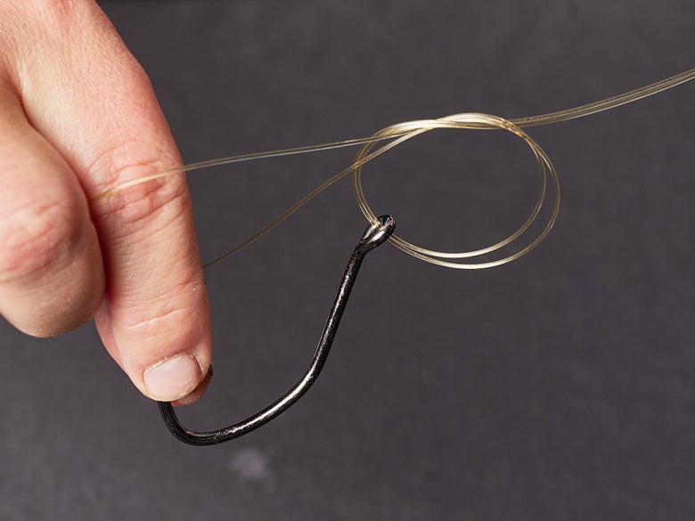 Pulling the hook through the knot