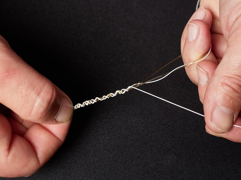 Braided line and leader wrapped together