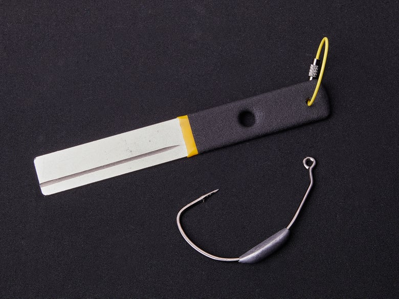 Hook file alongside a weighted swimbait hook