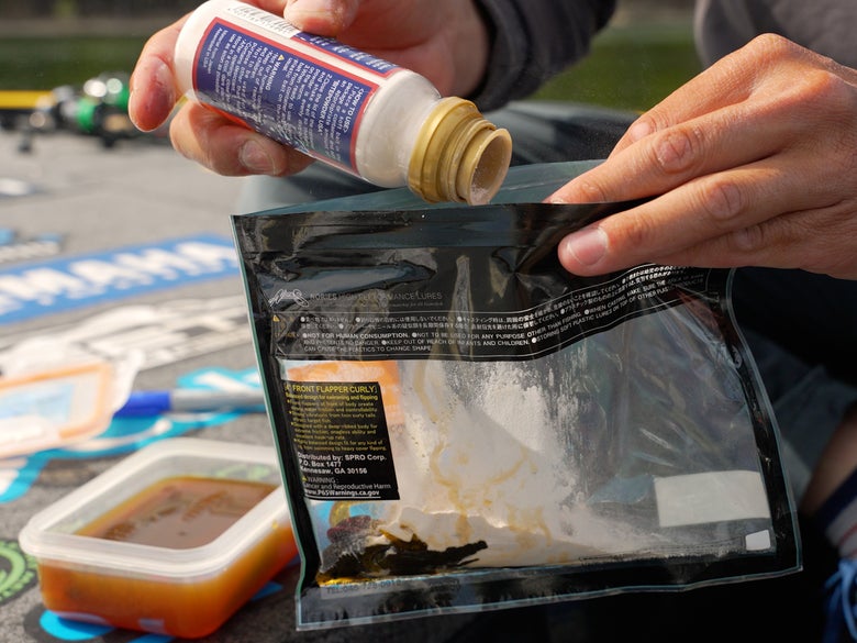 Image of bag being filled with Nories Bite Powder fish attractant