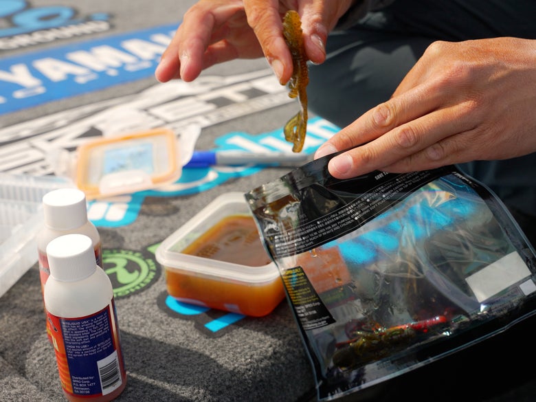 Image of baits being placed back into their original package or similar packaging