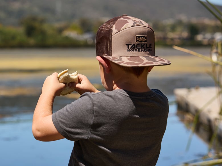 Image of small child taking a bite out of an uncdustable