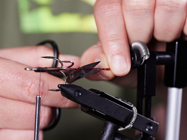 trimming flash material with scissors