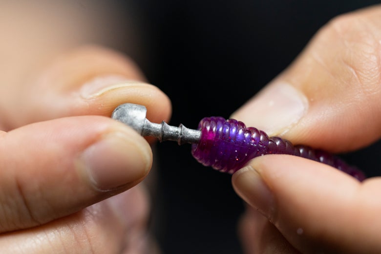 Inserting a nail weight into a soft-plastic bait