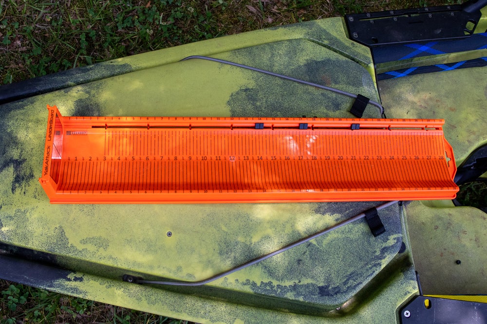 Measuring board on kayak