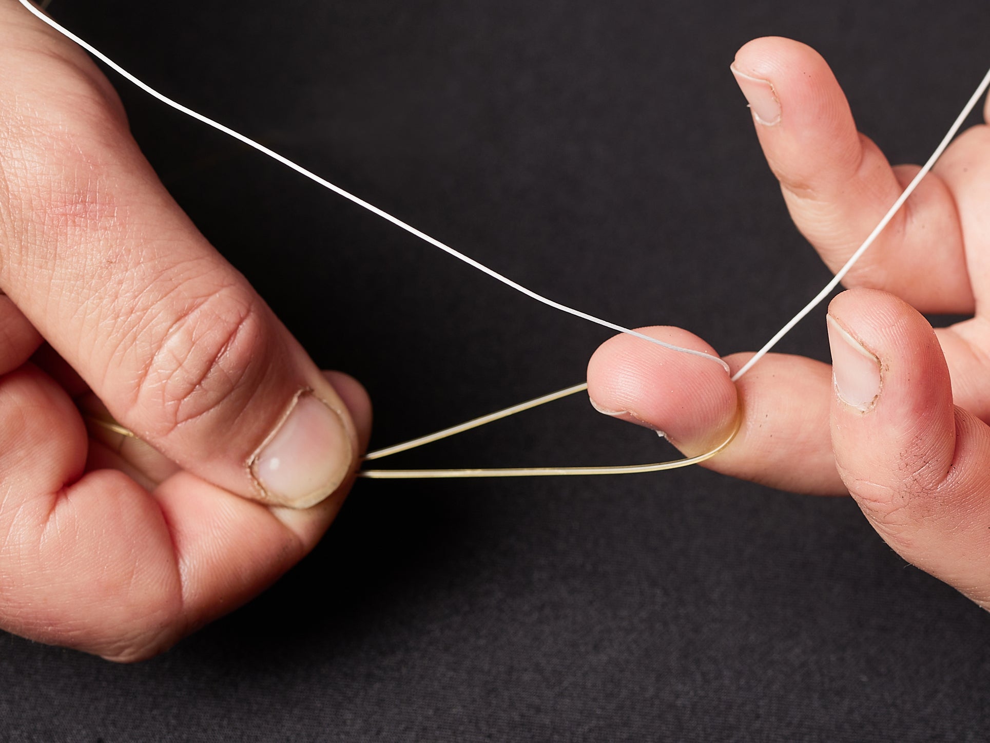 Pulling braided line through the loop of the main line