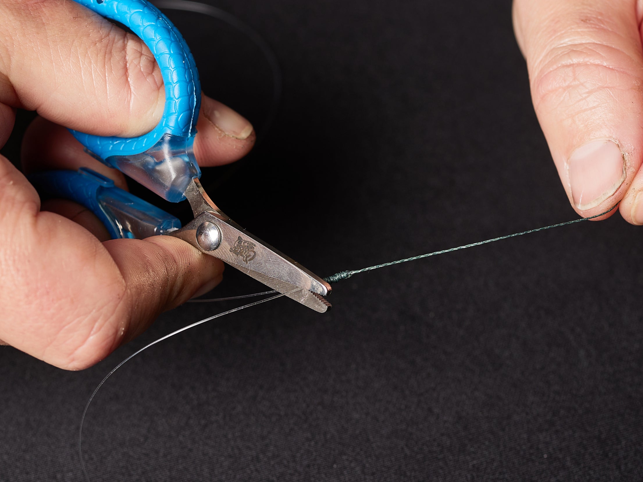 Trimming the line ends with scissors