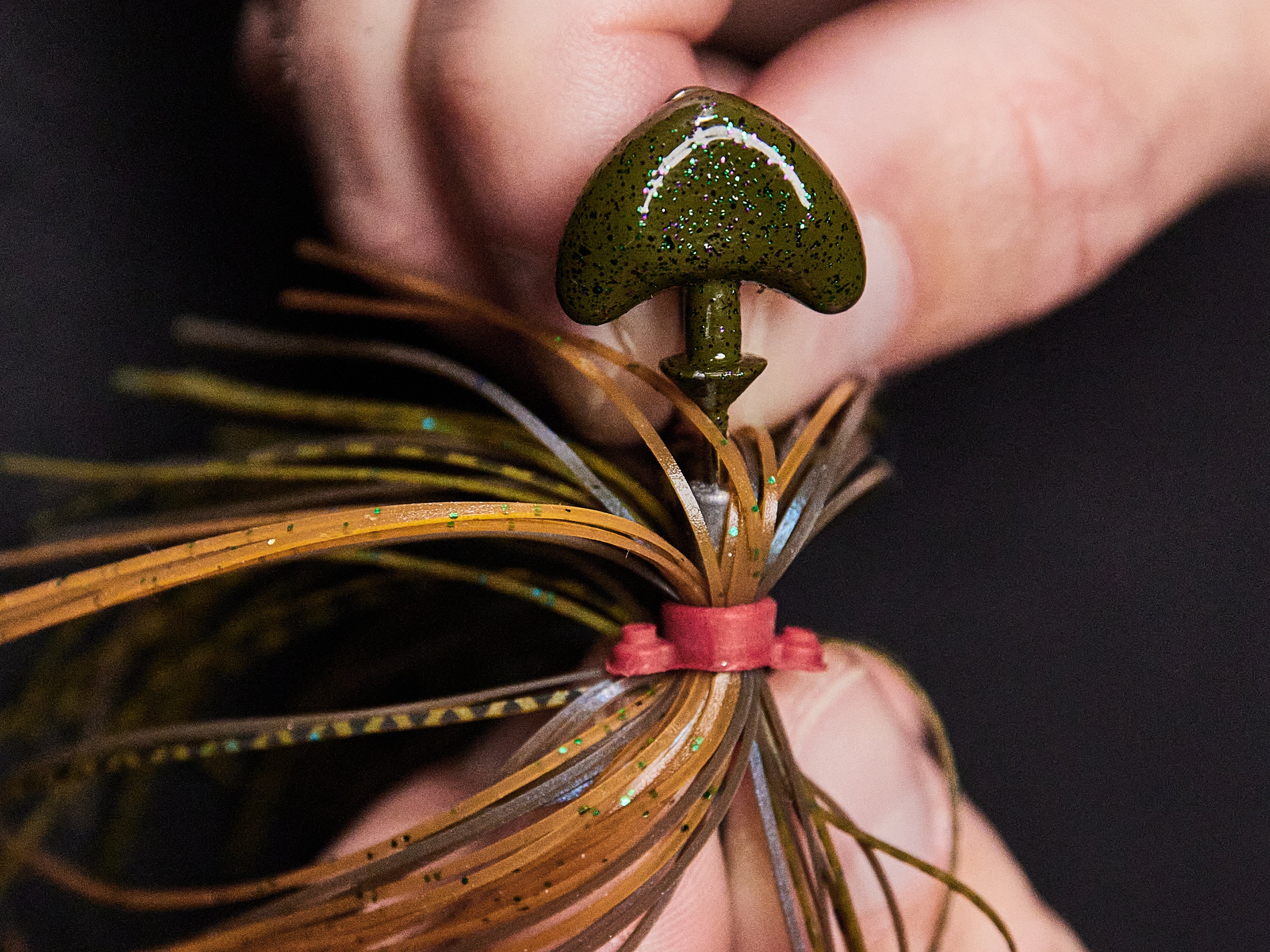 pushing new skirt up against jig head
