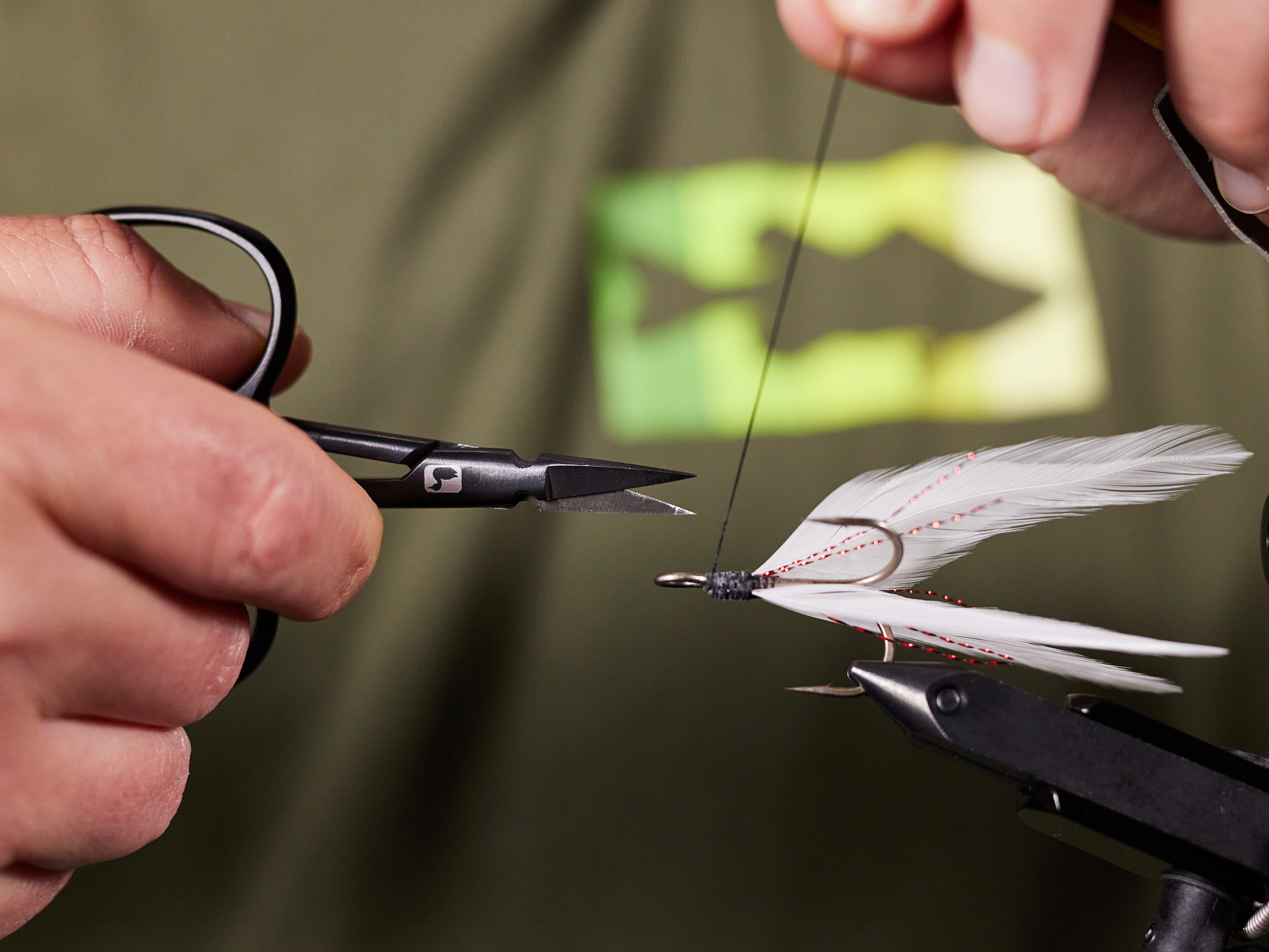 trimming the knot's tag end
