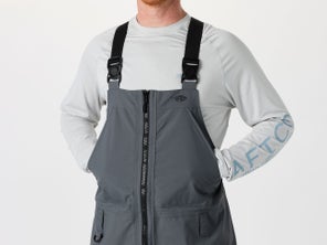 hands in pockets of the bibs