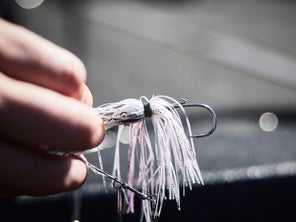 picture of spinnerbait and band that ties on the skirt material