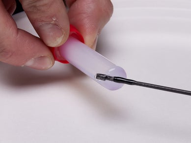 applying glue to rod tip