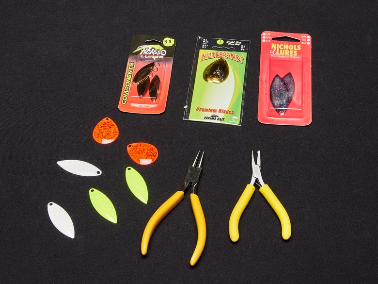 assorted tools for changing blades on lures